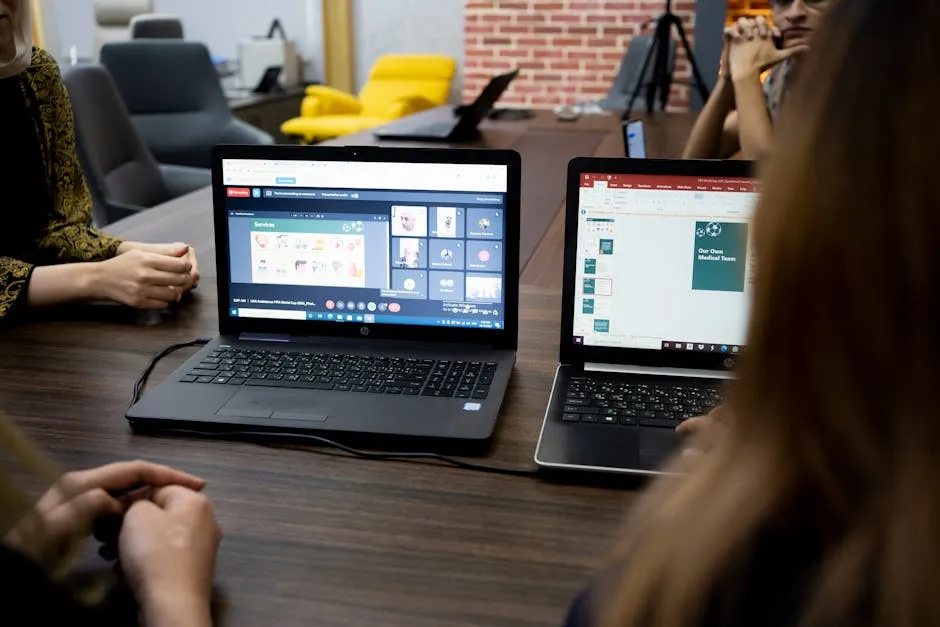 Team discusses projects during a virtual and in-person meeting in a Dubai office.