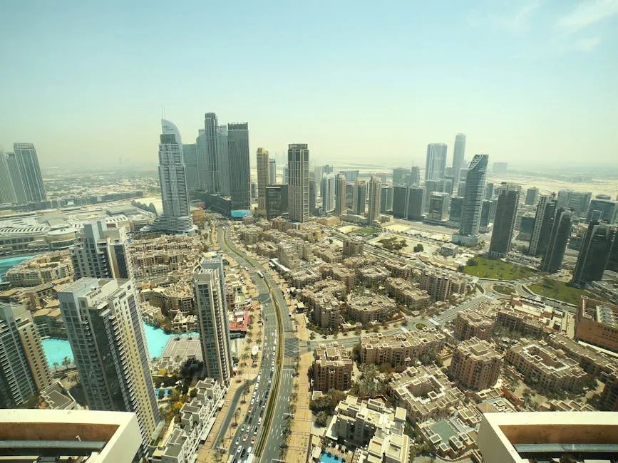 Stunning aerial view of Dubai's urban skyline with towering skyscrapers and bustling streets.