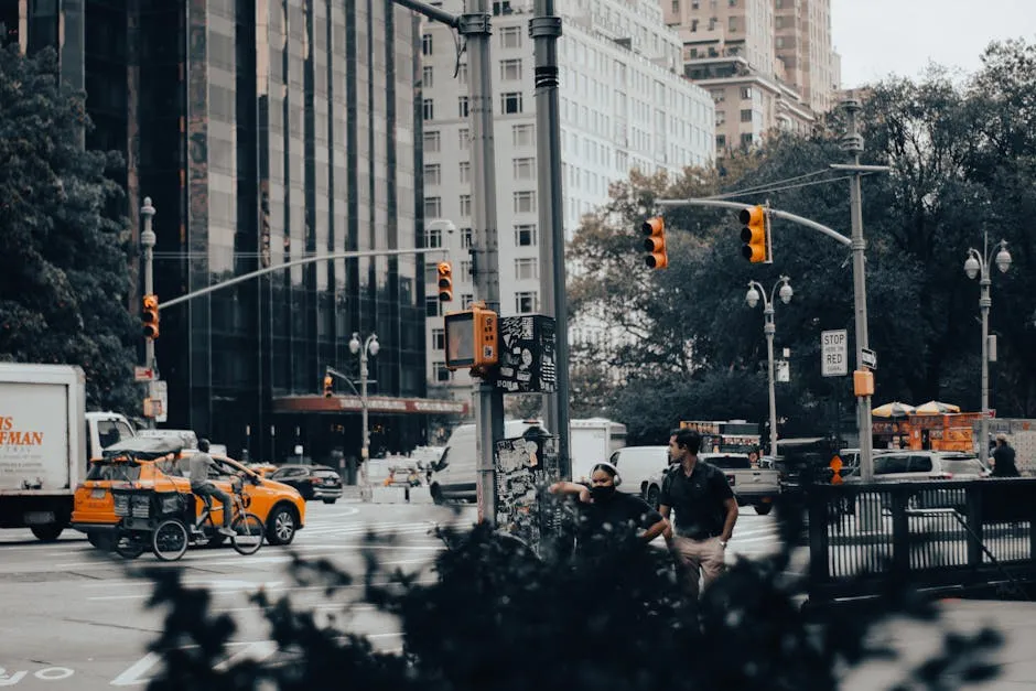 Vibrant New York City street scene featuring taxis, pedestrians, and skyscrapers.