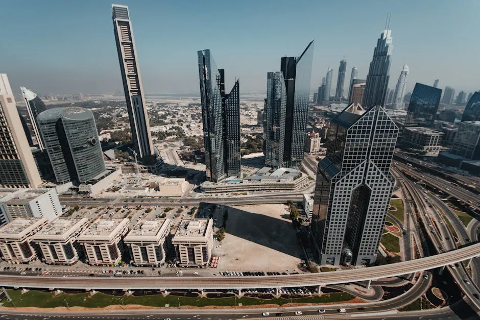 A breathtaking aerial view of Dubai's iconic skyscrapers and modern architecture in the bustling urban landscape.