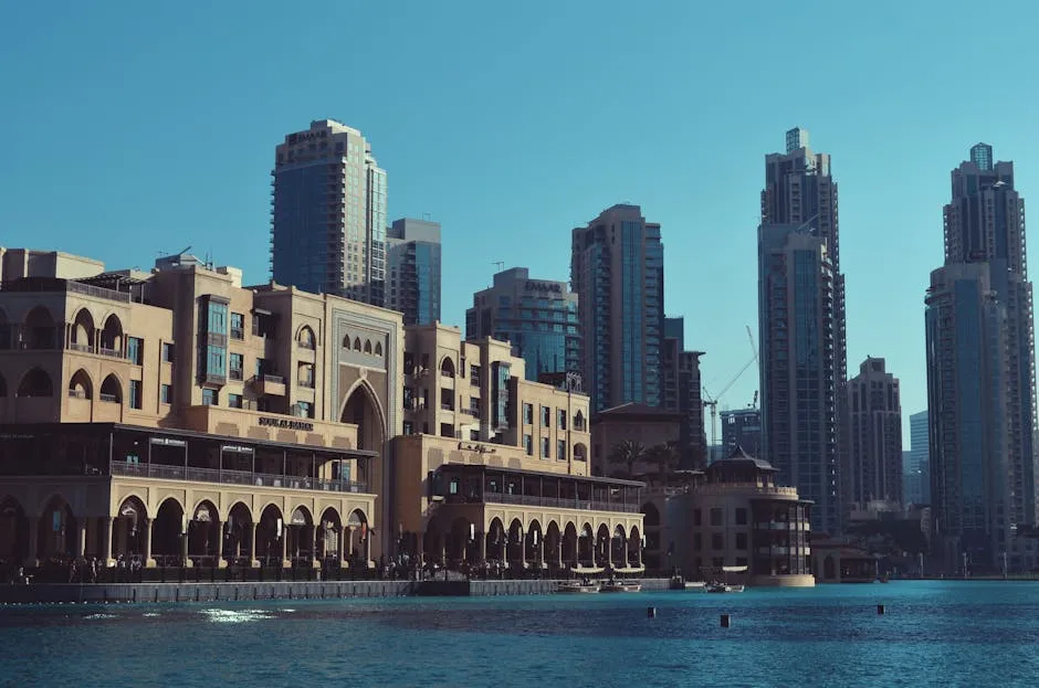 Stunning view of Dubai's iconic skyline featuring modern skyscrapers and calm waterfront.