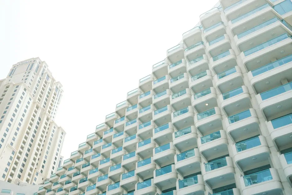 Overview of modern high-rise residential buildings in Dubai, emphasizing urban architecture.