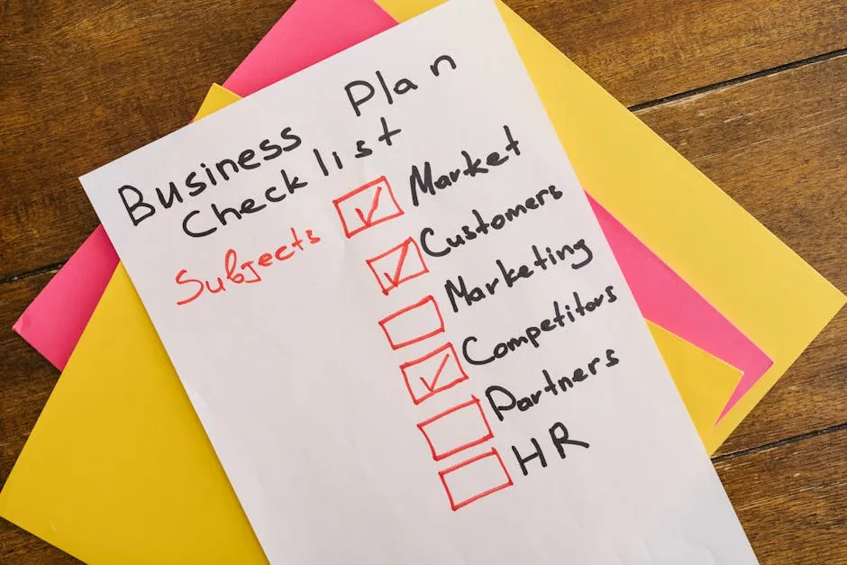 A handwritten business plan checklist on a table with colorful papers indicating important topics for startups.