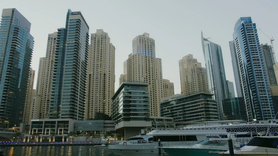 Stunning view of skyscrapers and yachts at Dubai Marina reflecting urban elegance.